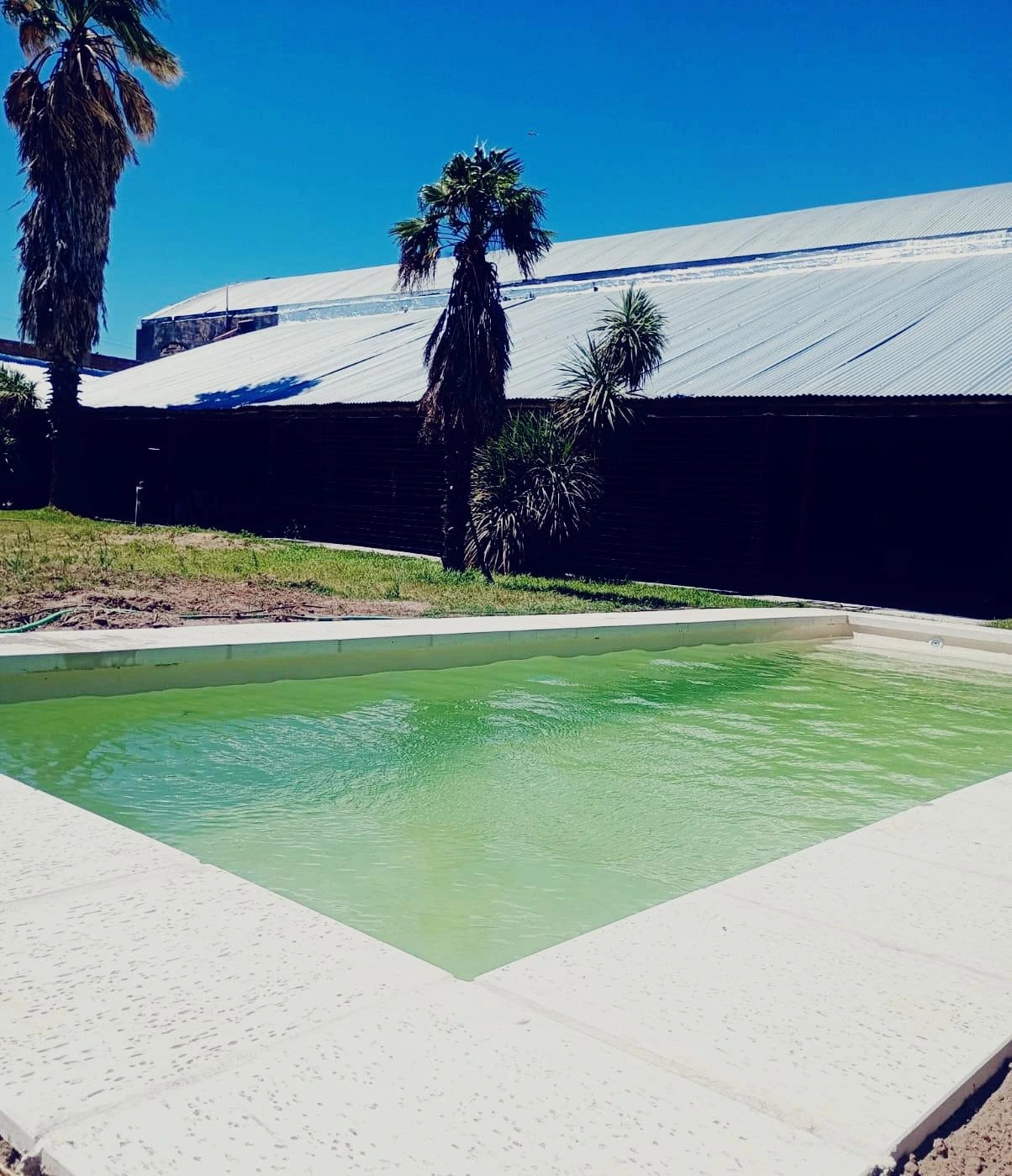 Pileta y espacios verdes Kairos